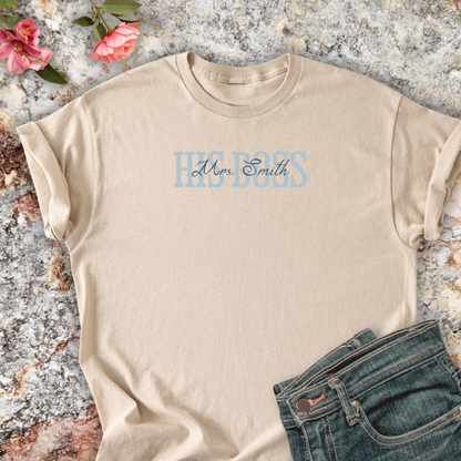 Sand shirt with 'HIS BOSS Mrs. Smith' text on a marble surface.